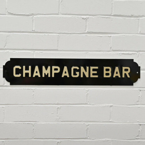Skylt "Champagne Bar"